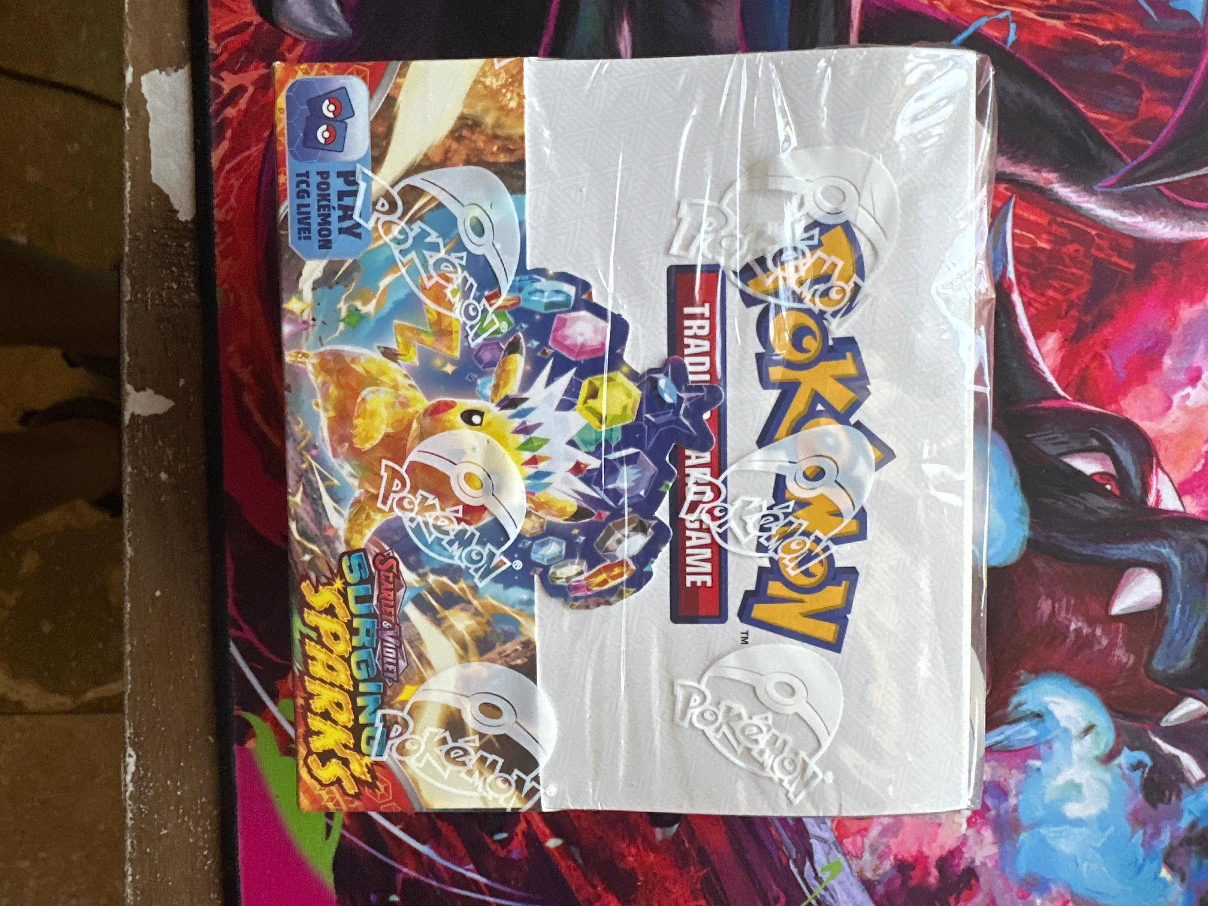 Scarlett and Violet: Surging Sparks Booster Box. Sealed and Unopened