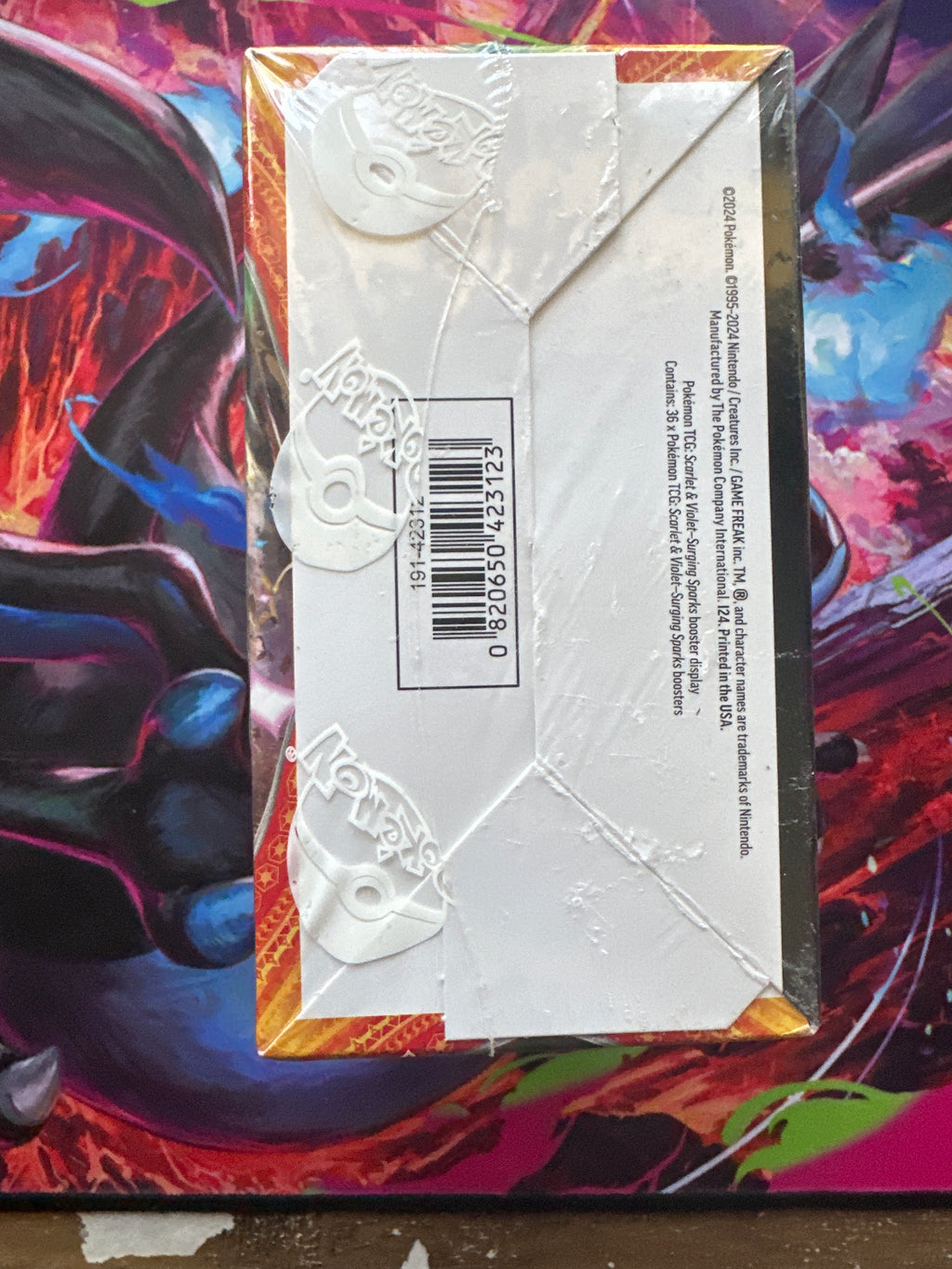 Scarlett and Violet: Surging Sparks Booster Box. Sealed and Unopened