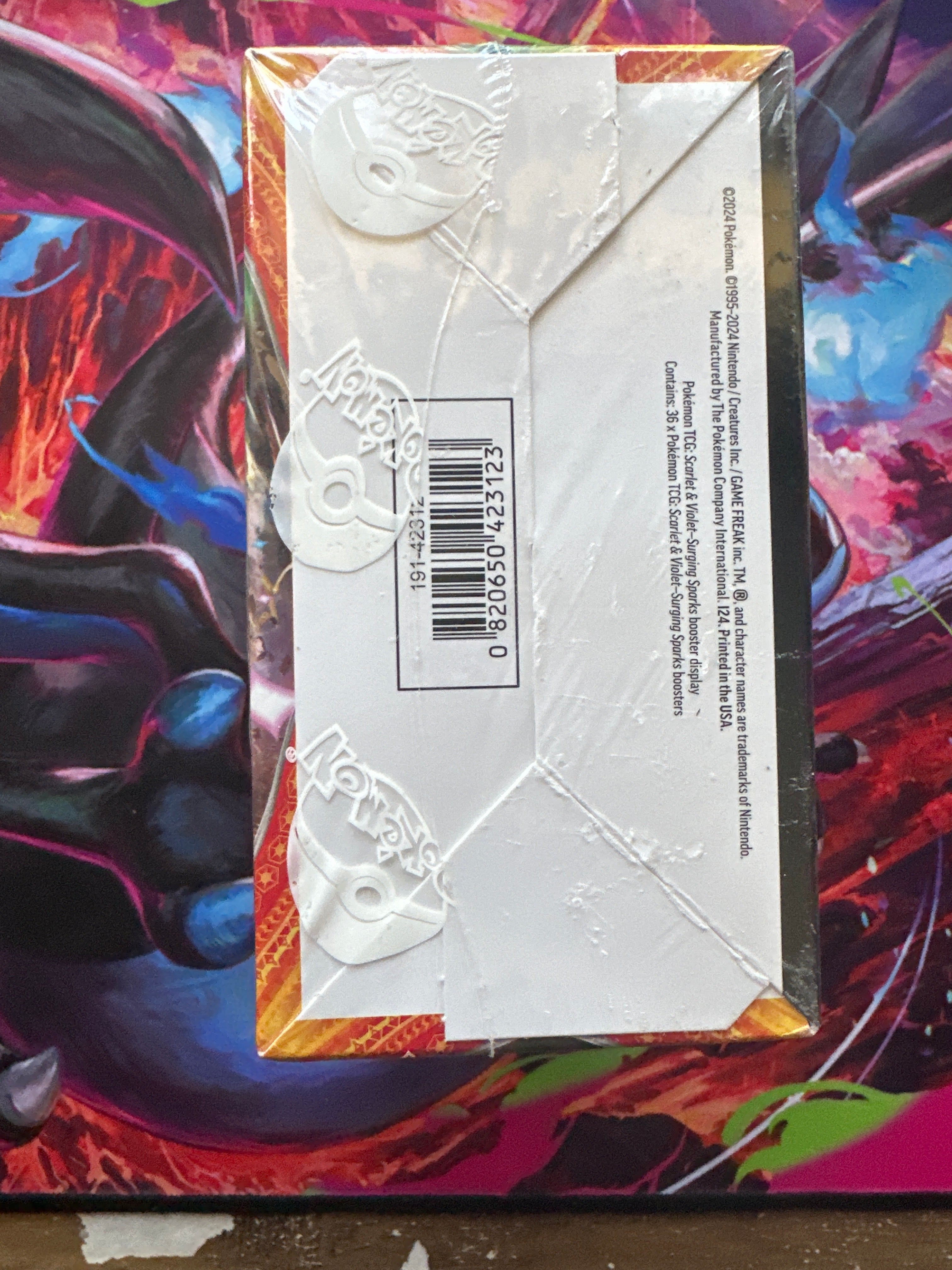Scarlett and Violet: Surging Sparks Booster Box. Sealed and Unopened